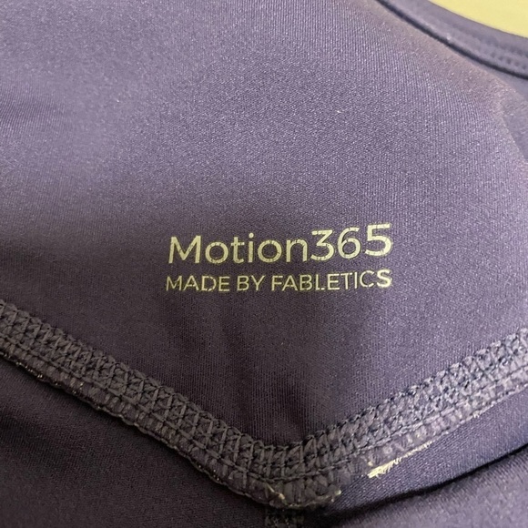 Fabletics Anywhere High-Waisted Moto 7/8 Length Leggings - Picture 7 of 10